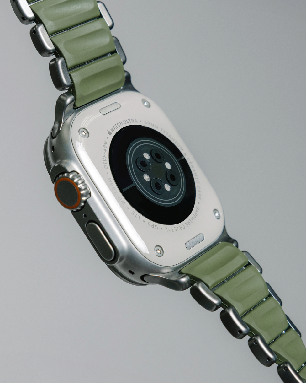 A refined, forest green that pairs effortlessly with titanium and never goes out of style.